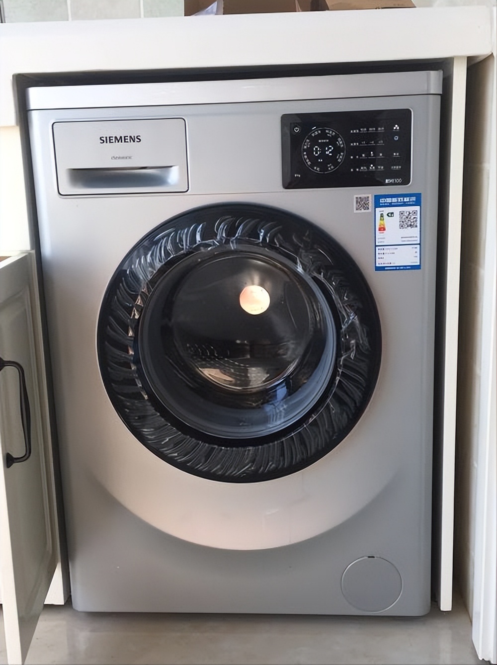 洗衣机买海尔还是买美的的,洗衣机买海尔的还是卡萨帝