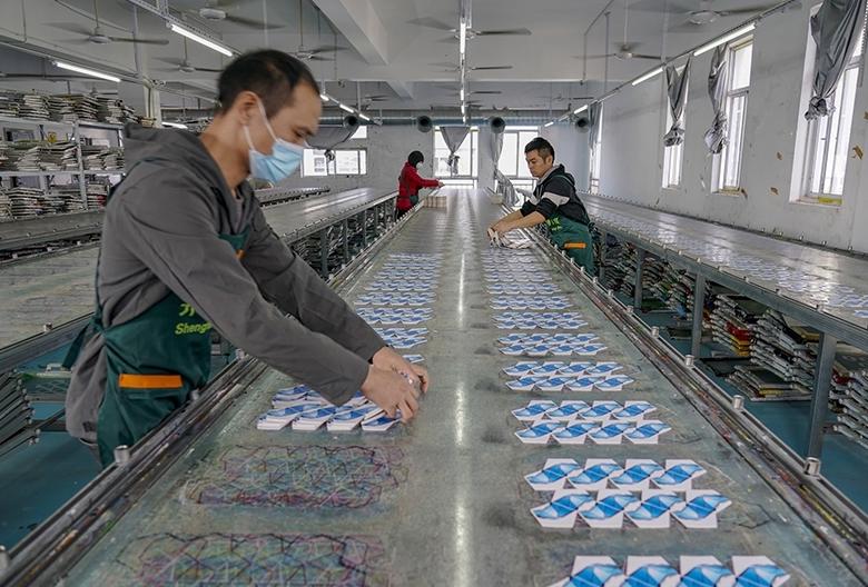 世界杯中国制造赚了多少,世界杯经济全球化