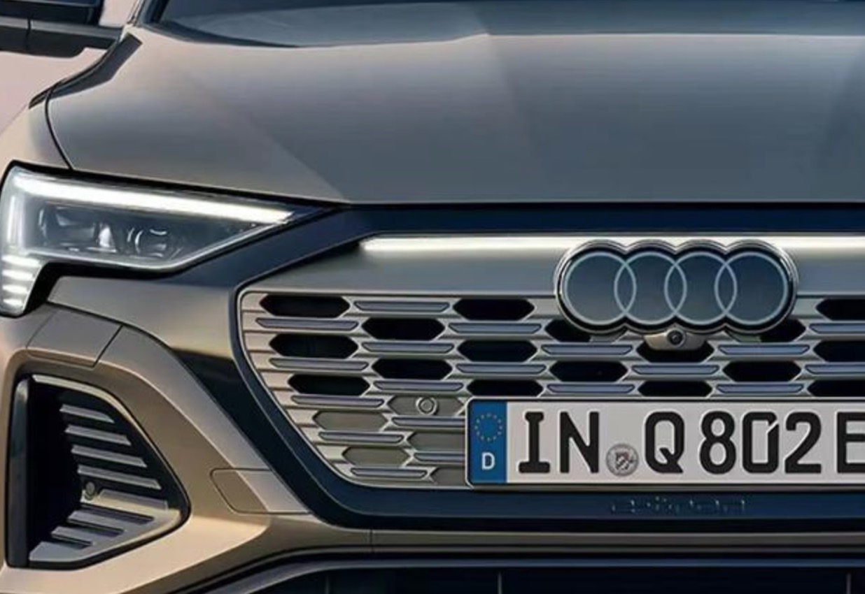 奥迪logo发光,奥迪换新标logo