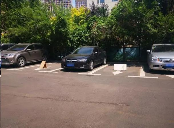 车位被占车主被判,买三个车位停玩具车一辆赔二万