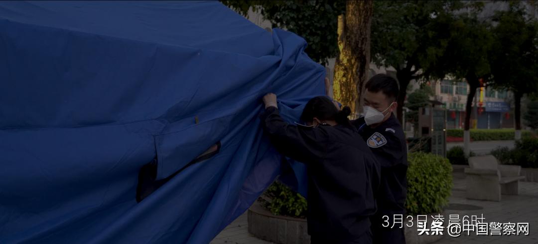 【疫情当前警察不退】一面*旗国**，一个人！50多天里，每天她只能跟街对面的家人挥挥手……